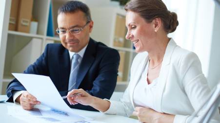 People reviewing tax documents